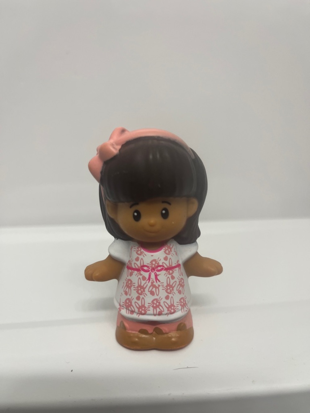 Fisher-Price little people Brown-Haired Girl Figurine with Pink Accents